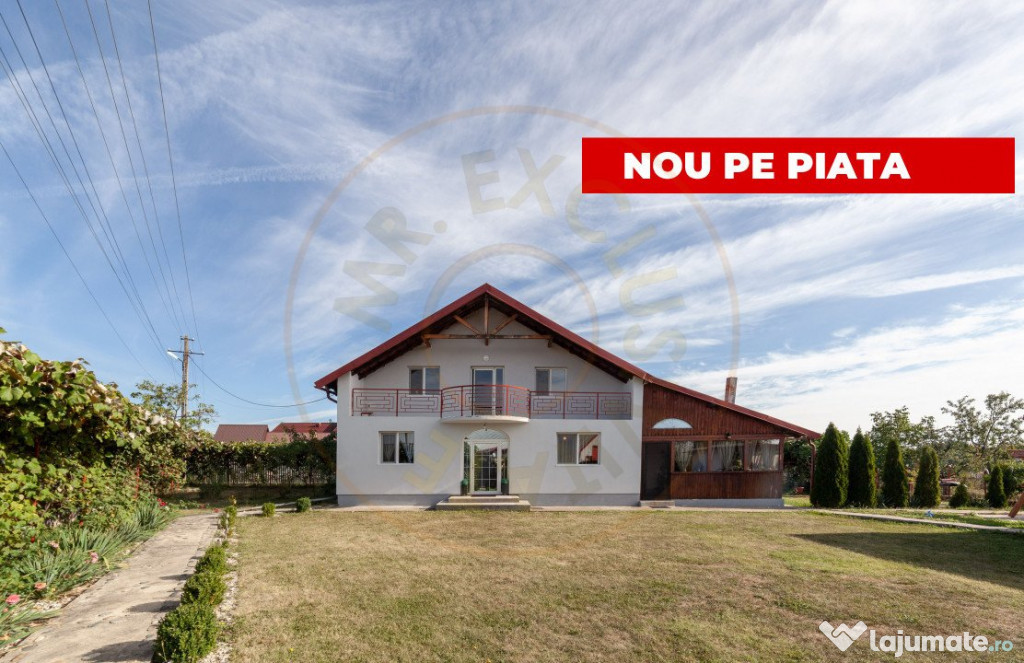 Casa cu teren generos si gradina spectaculoasa – Comuna Cu