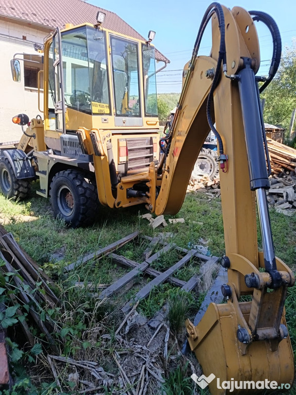 Buldoexcavator WOLF an 2020 cu doar 100 ore