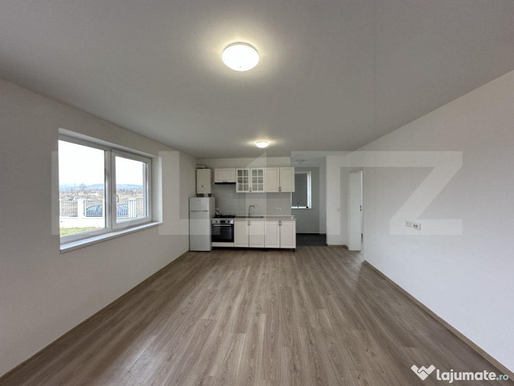 Casă individuală de închiriat, cu 2 dormitoare, curte - z