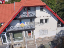 Casă modernă + Tesla Model S – ofertă unică în Piatra