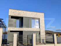 Casa moderna situata intr-o zona linistita, cu acces facil l