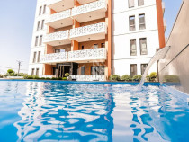 Apartament cu 3 camerere, mobilat de lux parcare subteran...