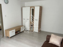 Apartament cu 2 camere,etajul 1, mobilat,centrala proprie...