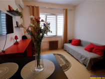 Garsoniera luminoasa,mobilata, accesorizata,loc parcare,Trac