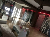 Casa individuala cu 7 camere si hala service,teren 600 mp...