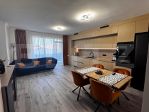 Apartament cu 3 camere, parcare subterana, incalzire in pard