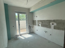 Apartament cu 2 camere decomandat + curte cadastrată