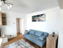 Apartament modern, 2 camere, 50 mp, parcare, A.C., zona C-ti