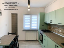 Apartament 2 camere,renovat integral,mobilat,utilat,zona Petrodava