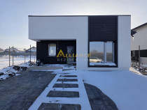 Casa de cu 3 camere,2 bai,teren 438mp