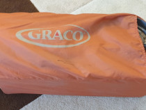 Pătuț pliabil și portabil Graco.