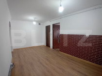 Apartament renovat cu 2 camere decomandate și garaj în Dum