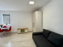 Apartament cu 2 camere tip studio - zona Tractorul