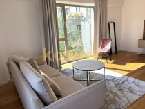 Apartament cu 2 camere, terasă și vedere spre grădină...