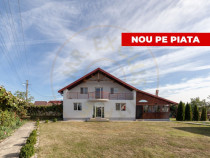 Casa cu teren generos si gradina spectaculoasa – Comuna Cu