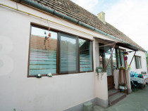 Casă Individuală cu Potențial Masiv de Renovare și Teren