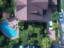 Vila individuala P+1+M cu curte spatioasa si piscina, zona foarte buna