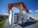 Casă modernă cu 5 camere, garaj și teren 590 mp.