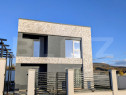 Casa moderna situata intr-o zona linistita, cu acces facil l