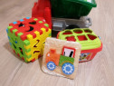 Camion si cuburi de construit + jucărie sortator forme și culori.