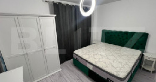 Apartament 2 camere modern cu curte proprie și parcare –