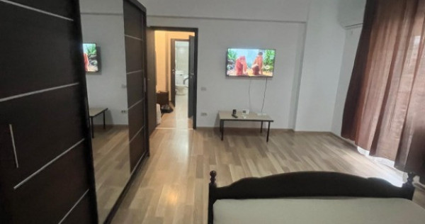 Închiriez garsoniera confort i decomandat