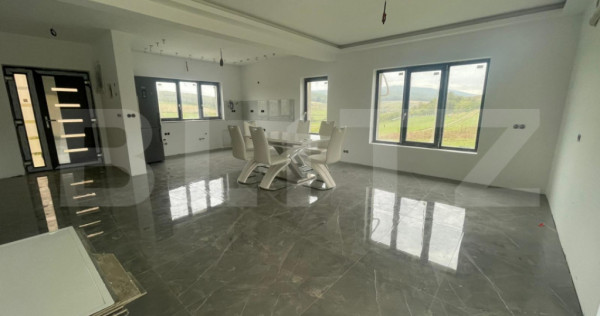 Casă practică și confortabilă, poziționată într-o zon