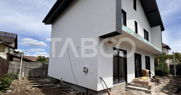 Casa cu 4 camere si 3 bai de vanzare 117mp teren 254mp turni