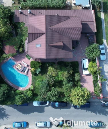 Vila individuala p+1+m cu curte spatioasa si piscina, zona foarte buna